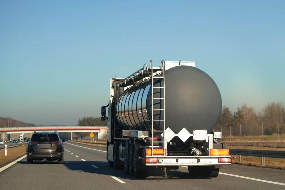 freepicdownloader.com-chrome-cistern-carrying-oil-gas-glides-through-city-s-veins-commerce-large.jpg